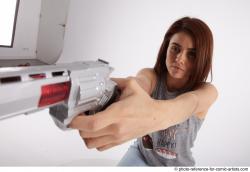 MOLLY SITTING POSE WITH GUN